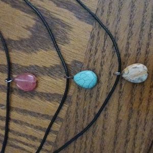 Never worn Womans stone three tier necklace